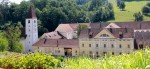 Gospodarska poslopja in podružnična cerkev sv. Erharda title=